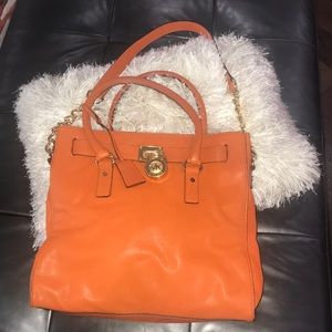 Michael Kors orange leather tote